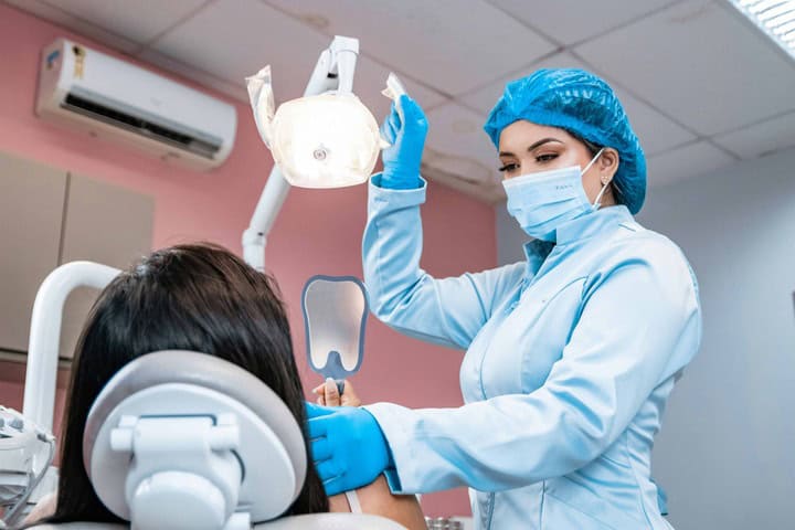 Dentures vs Implants: Burlingame Dentist’s Comparison Guide